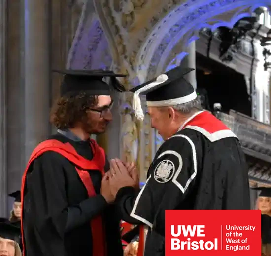 Luigi graduating with a Master's degree in health technology, with distinction